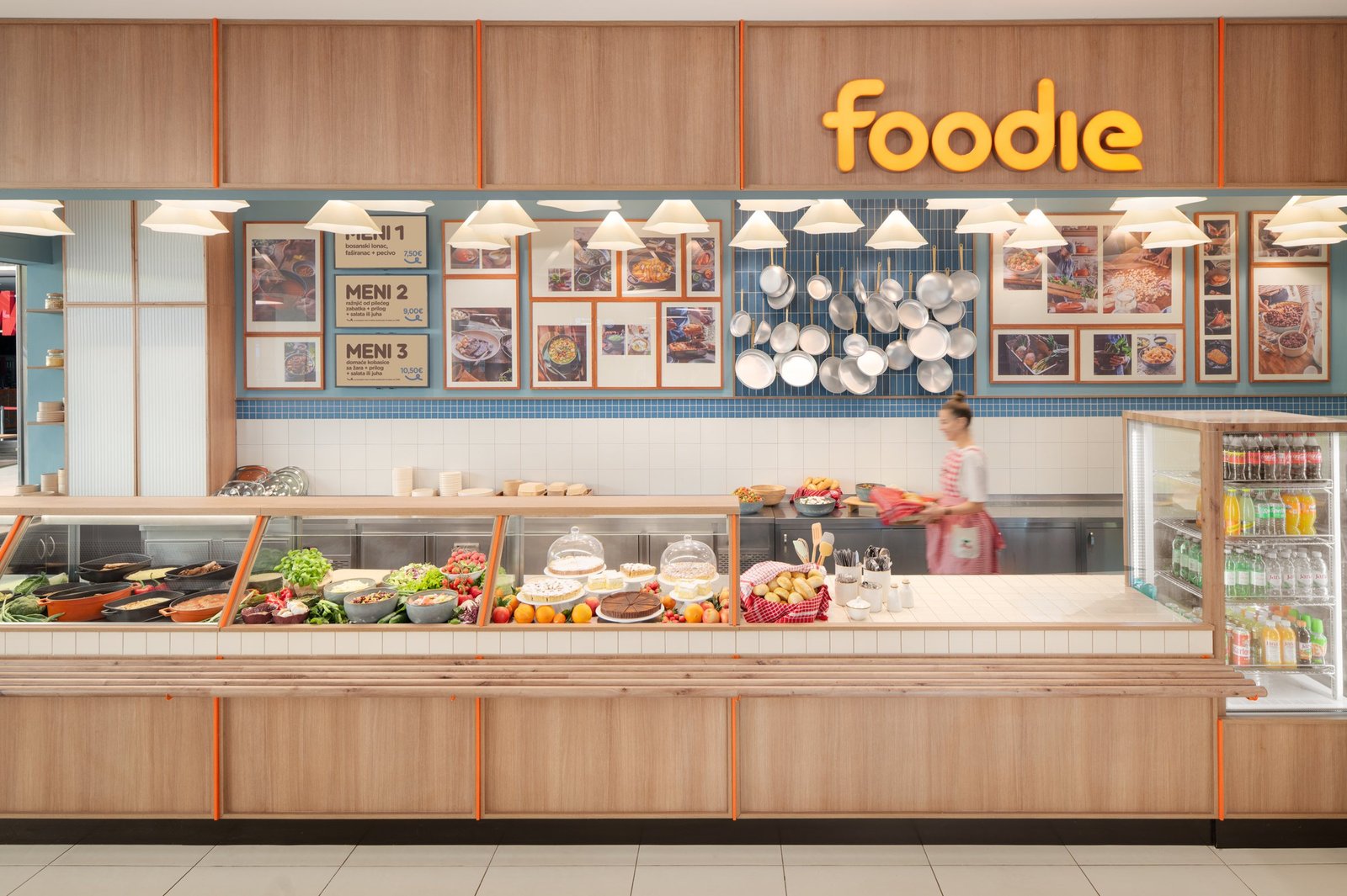 Foodie: timber counter with the orange foodie sign